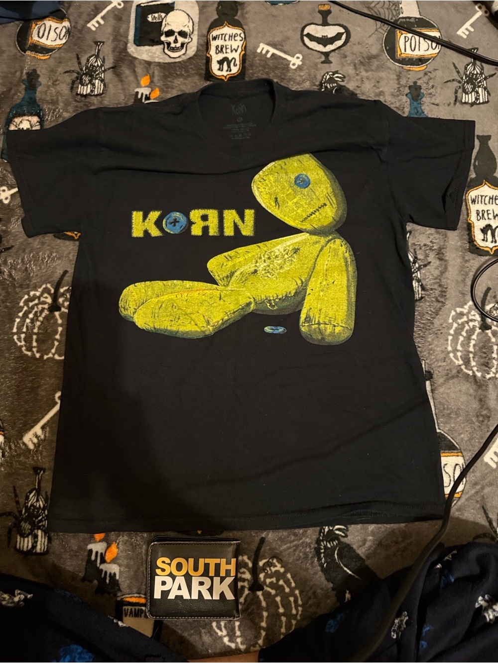 Graphic Tee with Yellow Voodoo Doll - Korn